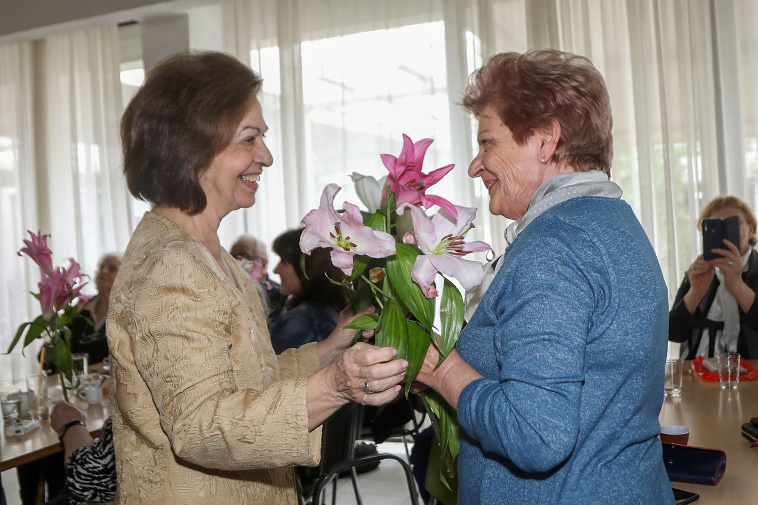 CROWN PRINCESS KATHERINE BRINGS FLOWERS TO LADIES AT SENIOR PEOPLE HOME